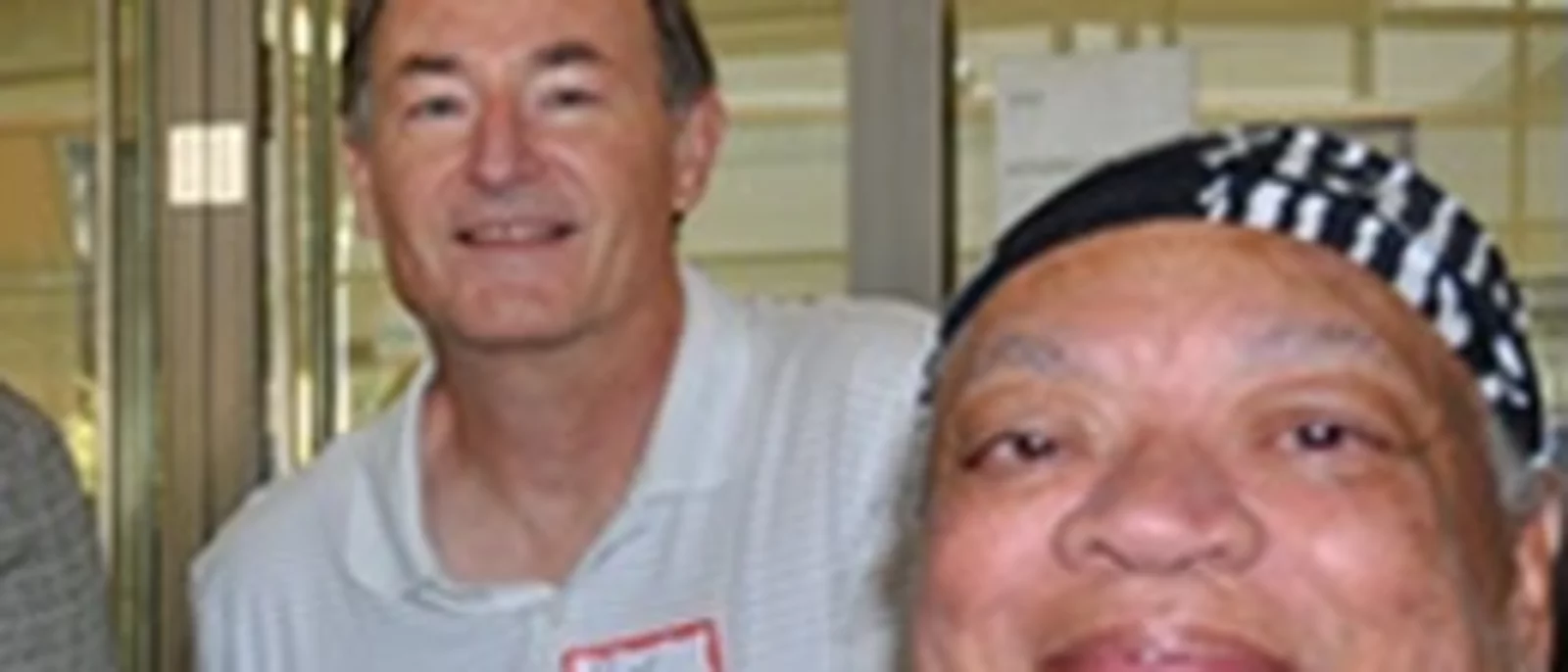 Dr. Ron Hays smiling with Dr. Loretta Jones.